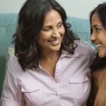 Two women talking.