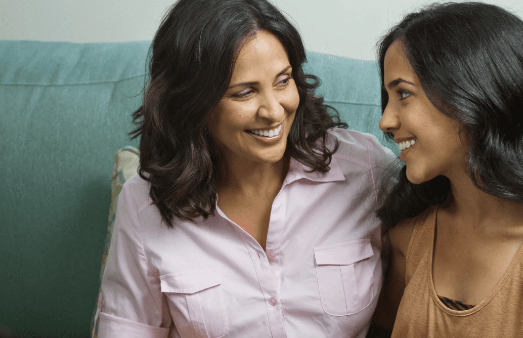 Two women talking.